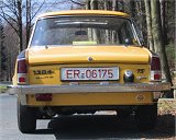 schraeg hinten